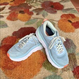 Hoka One One Blue and Orange Athletic Shoes with Streamlined Design